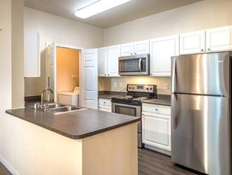 Kitchen showing stainless steel appliances