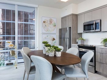 Kitchen and dining room Kitchen and dining room at The Rey, San Diego - Photo Gallery 6