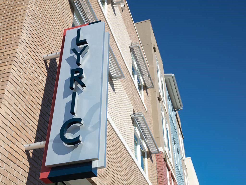 Outdoor view of building with Lyric sign at Lyric, California, 94596