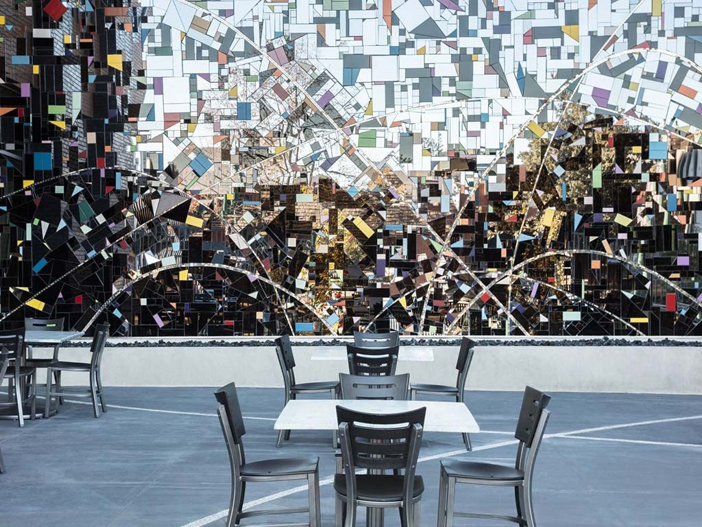 Outdoor art installation with chairs and cafe tables at Lyric, California