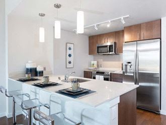 View of kitchen and breakfast bar at Lyric, California, 94596 - Photo Gallery 2