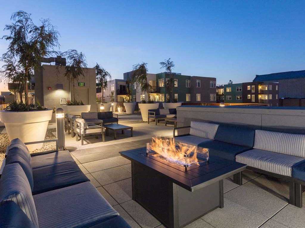 Common area rooftop deck firepit at Lyric, California, 94596