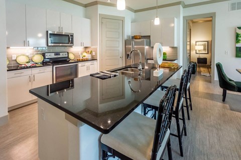 Eat-In Kitchen Table With Sink at Berkshire Spring Creek, Texas, 75044