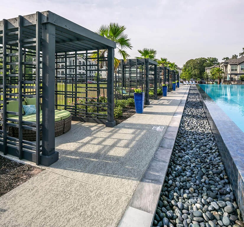 Shaded Lounge Area By Pool at Berkshire Woodland, Texas, 77384
