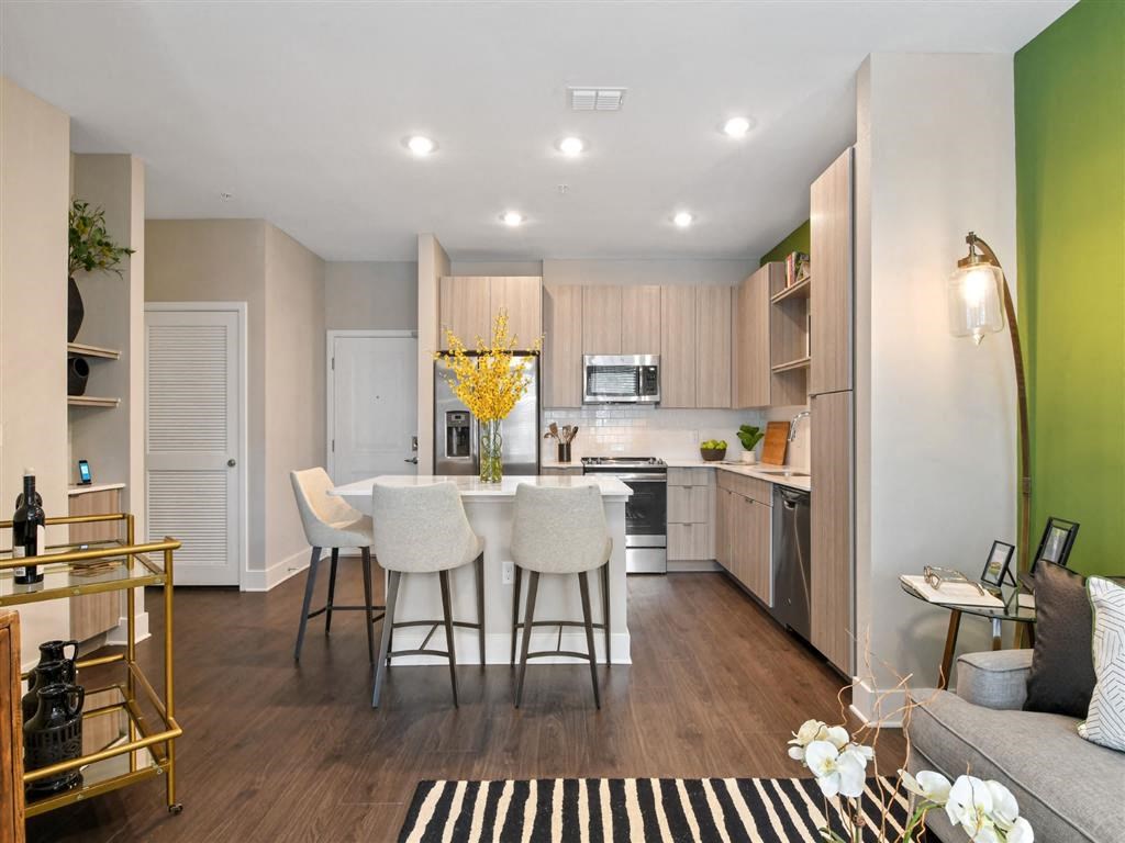 Living Room With Kitchen View at Berkshire Winter Park, Winter Park