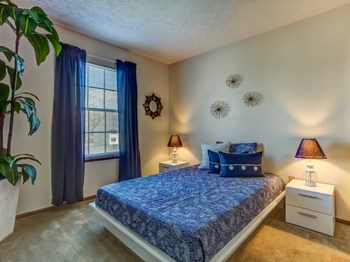 Bedroom With Expansive Windows at Lake Forest Apartments, Westerville, OH - Photo Gallery 6