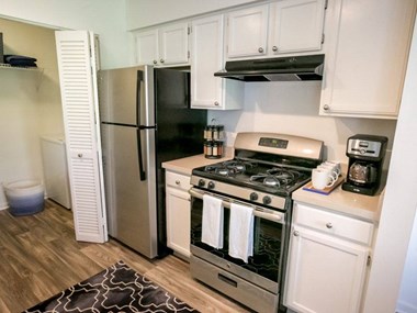 Kitchen with Stainless steel appliances  Kensington Grove apartments