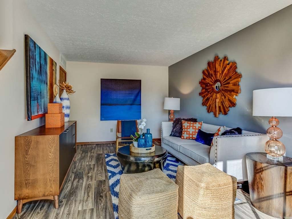 a living room with a couch and a table