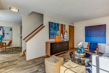 Living room at Bedford Commons Apartments & Heathermoor Apartments, Columbus, OH, 43235 - Photo Gallery 4