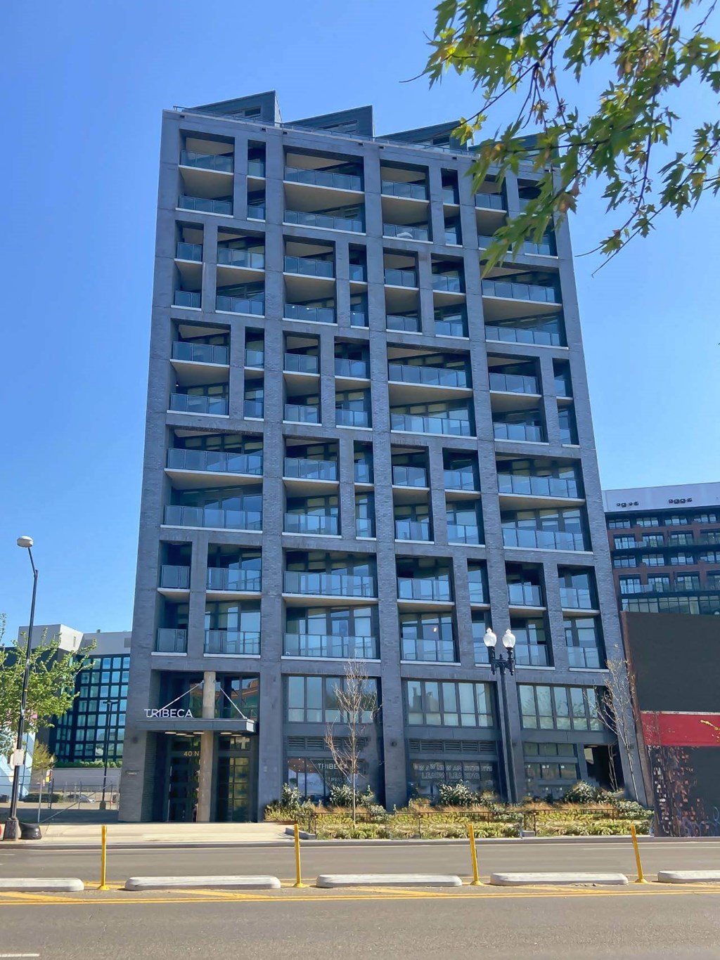 a street view of the exterior of Tribeca NOMA apartments in Washington DC