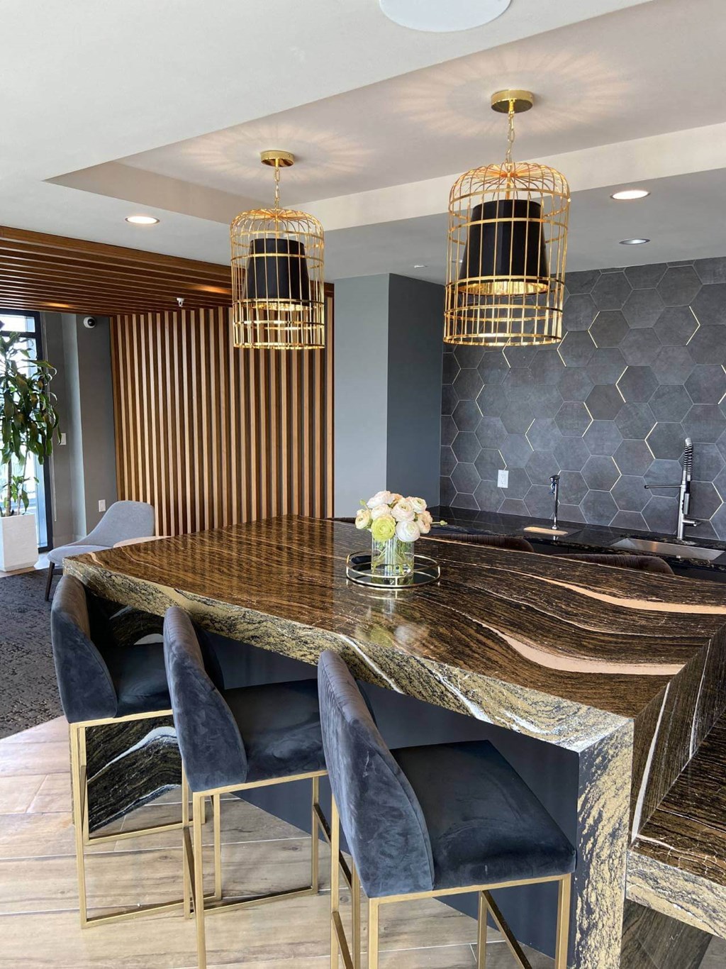 a conference room with a large table and luxurious chairs in Tribeca NOMA apartments