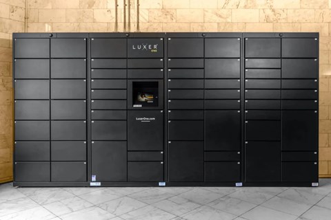 A large black LUXER storage unit with a glass door in the middle.