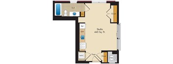 A floor plan of a studio apartment with a bathroom, kitchen, and a studio space.