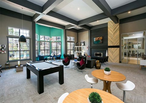 resident social lounge with billiards at Retreat Westminster Center apartments