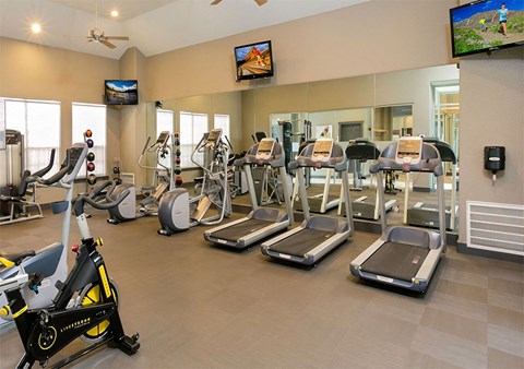 fitness center with cardio equipment at Retreat Westminster Center apartments