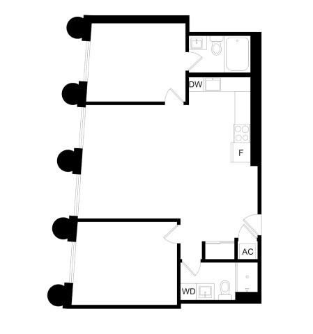 A floor plan of a room with a kitchen area and a bathroom.