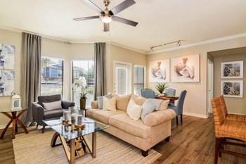 Palm Valley apartments living room with ceiling fan - Photo Gallery 11