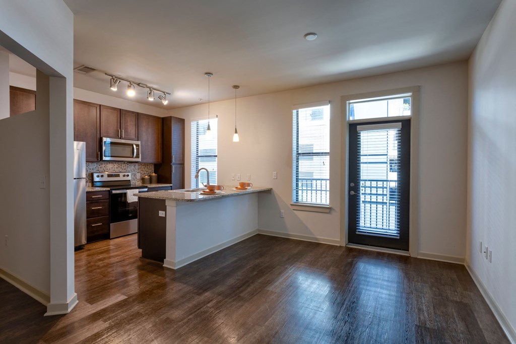 open concept kitchen and hardwood inspired flooring at Artisan on 18th, Tennessee, 37203