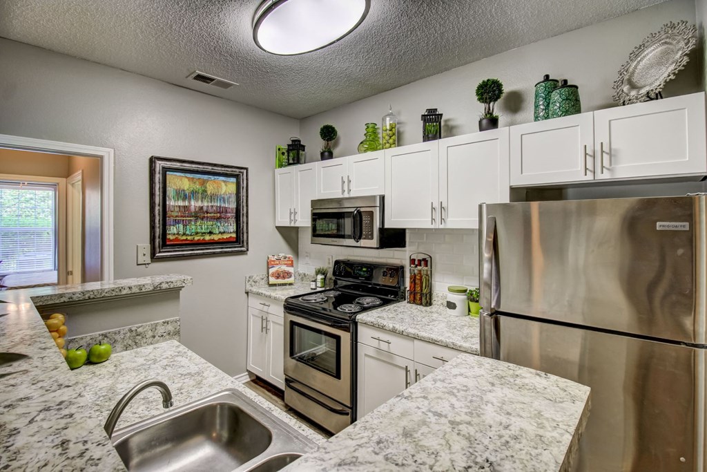 Spacious kitchen with stainless appliances at Wyndchase Aspen Grove