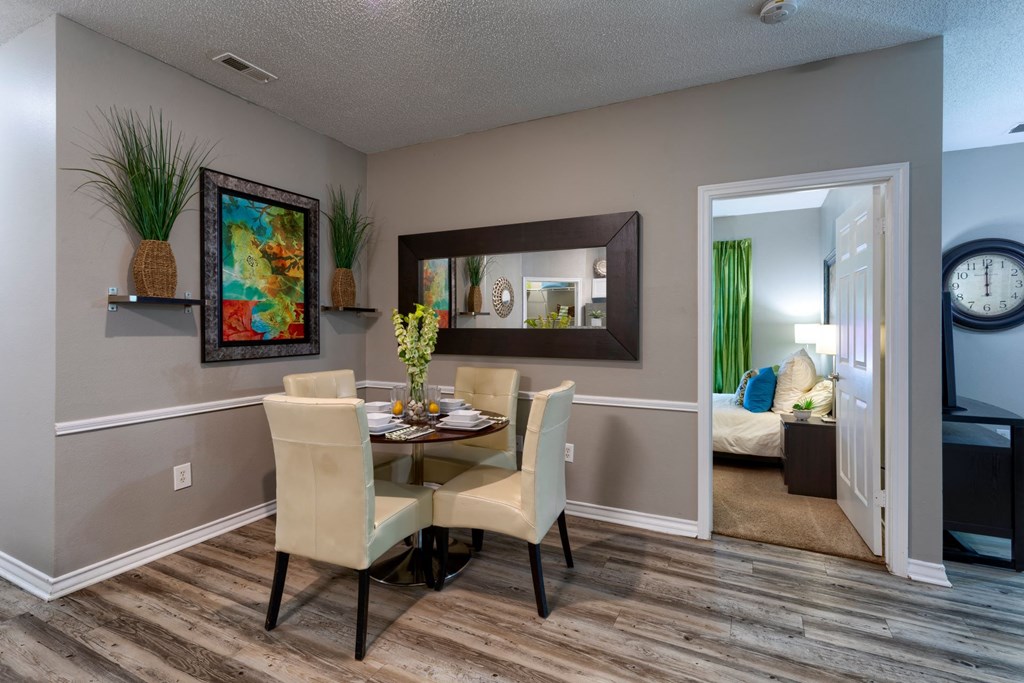 Elegant Dining Space Dining room with wood inspired flooring at Wyndchase Aspen Grove, Franklin
