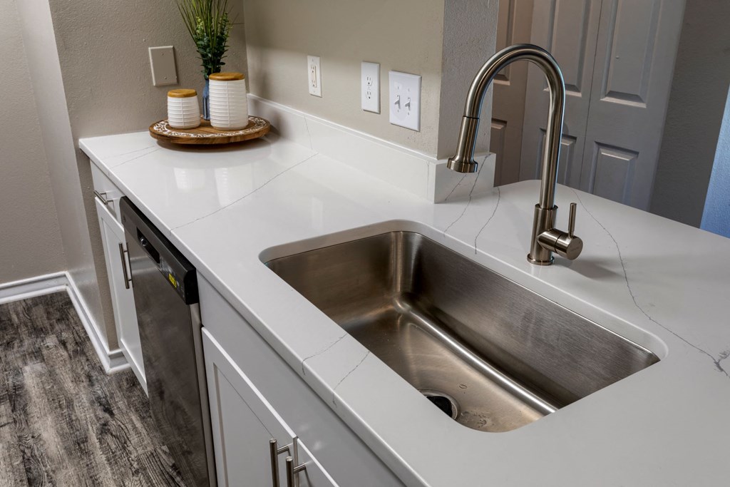 Kitchen with undermount sink and designer faucet at Wyndchase Aspen Grove, Franklin, TN, 37067
