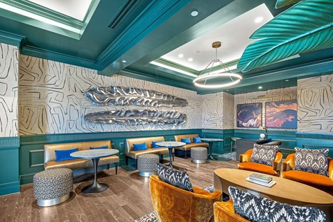 A restaurant interior with a large fish sculpture on the wall.