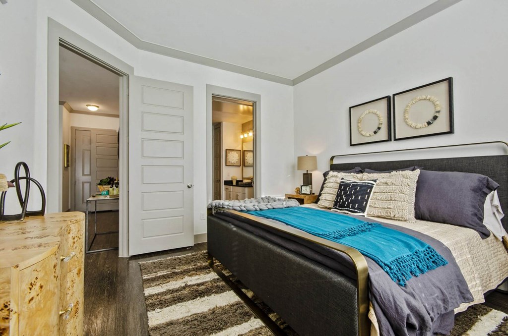Bedroom with comfy bed Bedroom with comfy bed at Reveal at Bayside, Rowlett, Texas