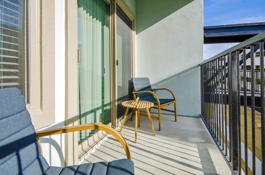 Balcony with chairs at Reveal at Bayside, Texas, 75088