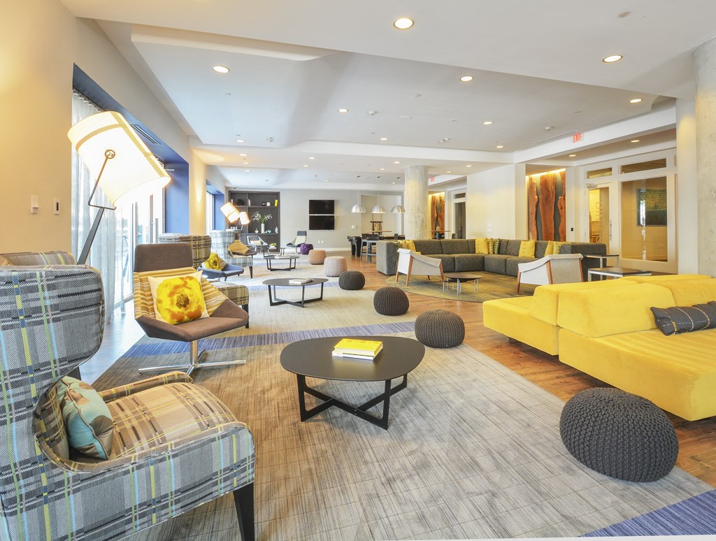 Resident lounge with multiple soft seating areas