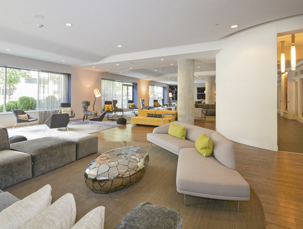 Resident lounge with multiple soft seating areas