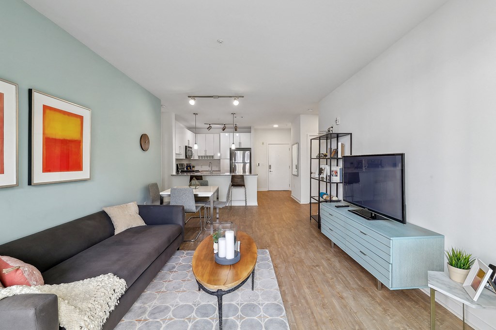 a living room with a couch and a tv