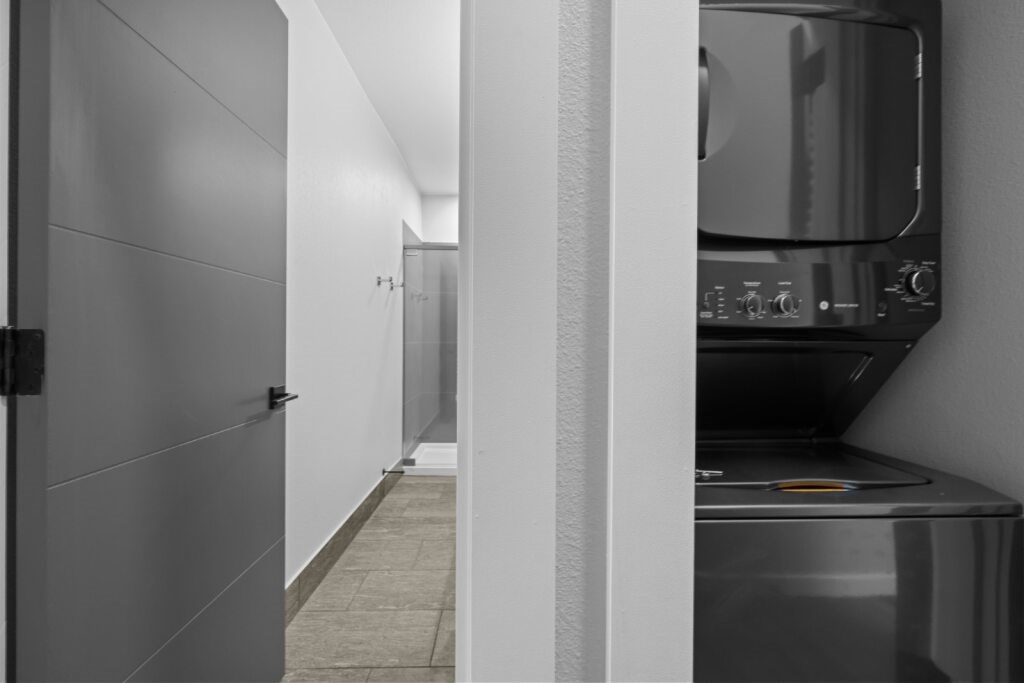 A modern kitchen with a stainless steel oven at The Avenue Lofts Golden Apartments, Golden 80401