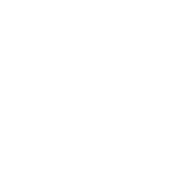 White logo at The Avenue Lofts Golden Apartments, Golden, CO, 80401