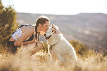 Woman With Her Dog Woman With Her Dog at Brownstones at Palisade Park Townhomes, Chartered Development, Colorado - Photo Gallery 3