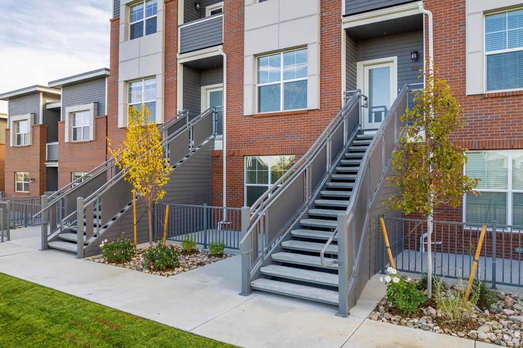 exterior of townhomes and staircases to front door at Palisade Park Townhomes, Broomfield, Colorado, 80023