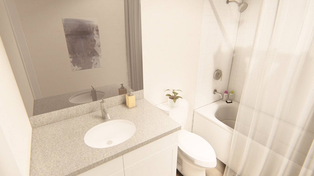 a bathroom with a sink toilet and bathtub at Brownstones at Palisade Park Townhomes, Broomfield, 80023