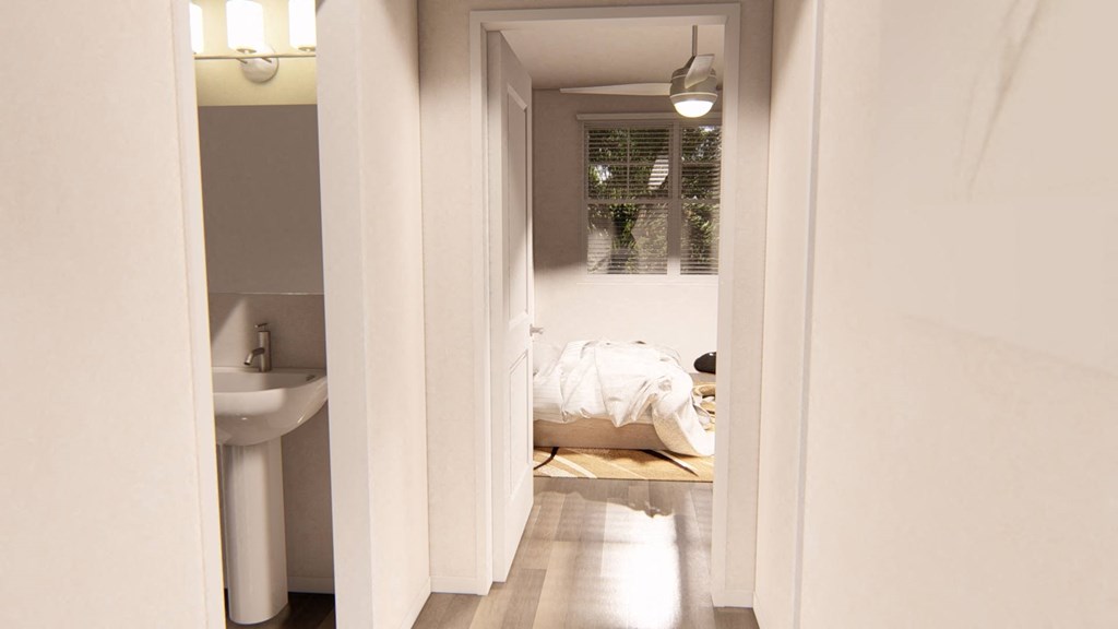 a bedroom with a bed and a sink at Brownstones at Palisade Park Townhomes, Broomfield, 80023