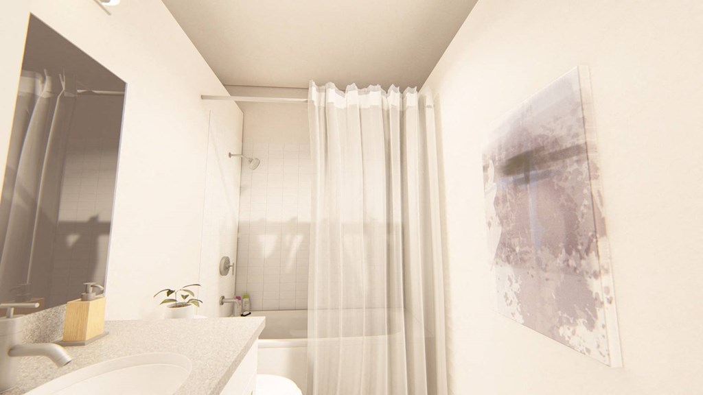 a bathroom with a white sink and a white shower curtain at Brownstones at Palisade Park Townhomes, Colorado