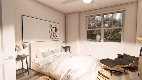Bedroom with white bedding and modern artwork at Brownstones at Palisade Park Apartments, Broomfield, 80023