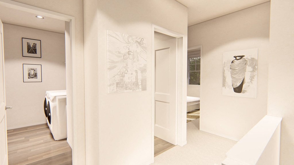 a hallway with white walls and wood floors at Brownstones at Palisade Park Townhomes, Broomfield, CO