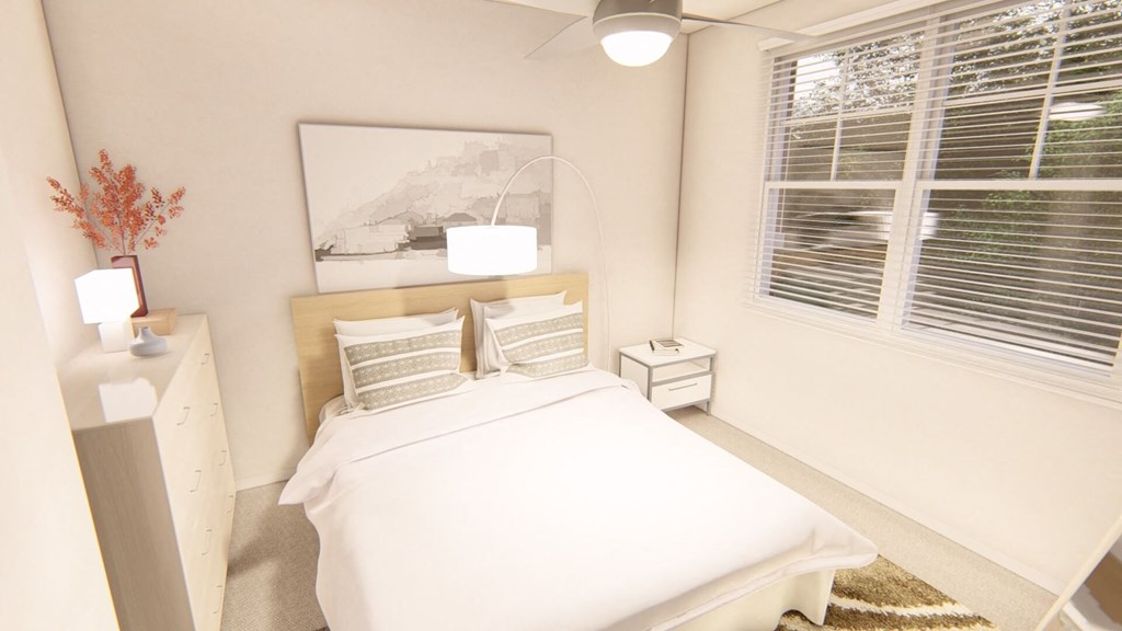 a bedroom with a bed and a large window at Brownstones at Palisade Park Townhomes, Broomfield, CO