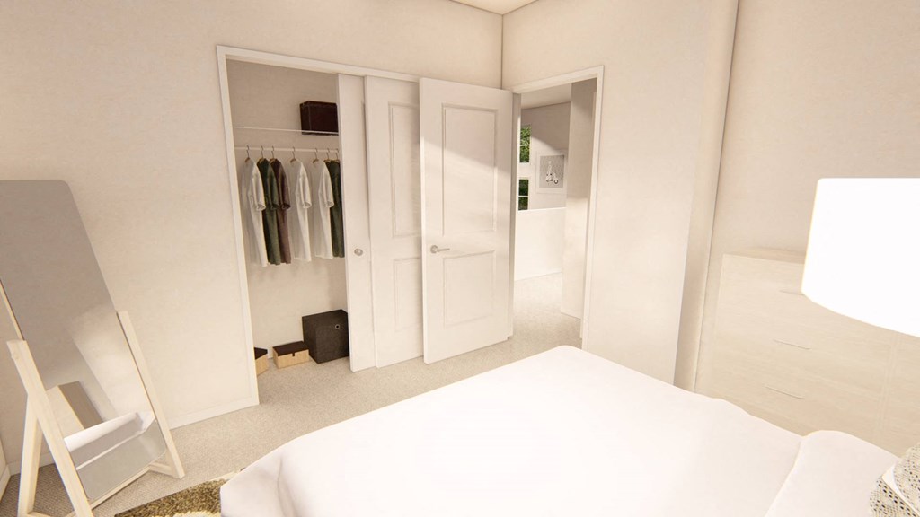 a bedroom with a bed and a wardrobe at Brownstones at Palisade Park Townhomes, Broomfield