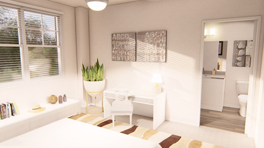 a bedroom with a bed and a chair in a room at Brownstones at Palisade Park Townhomes, Broomfield, 80023