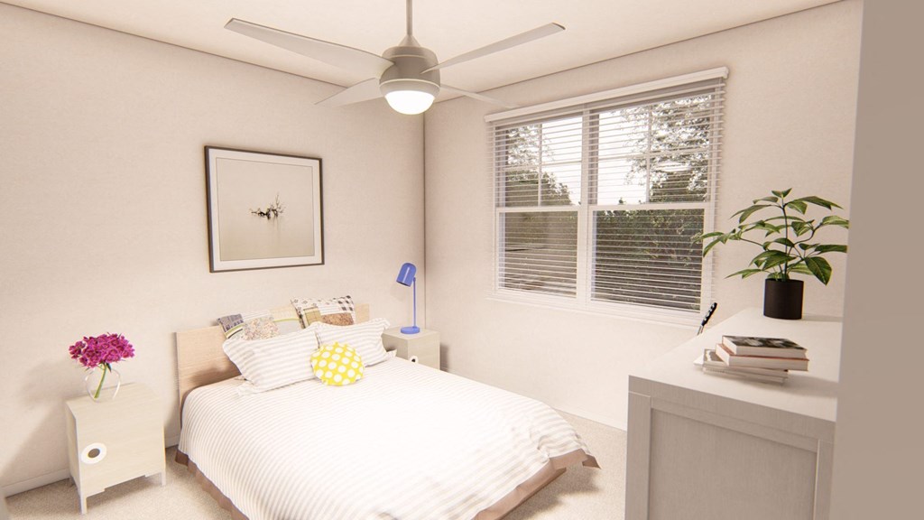 a bedroom with a bed and a ceiling fan at Brownstones at Palisade Park Townhomes, Broomfield