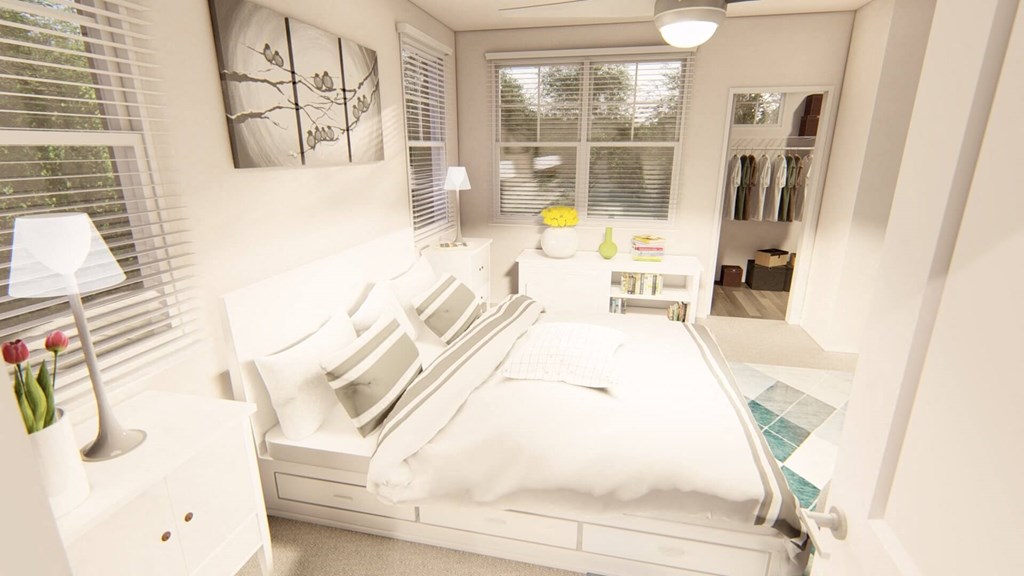 a bedroom with a bed and two windows at Brownstones at Palisade Park Townhomes, Colorado, 80023