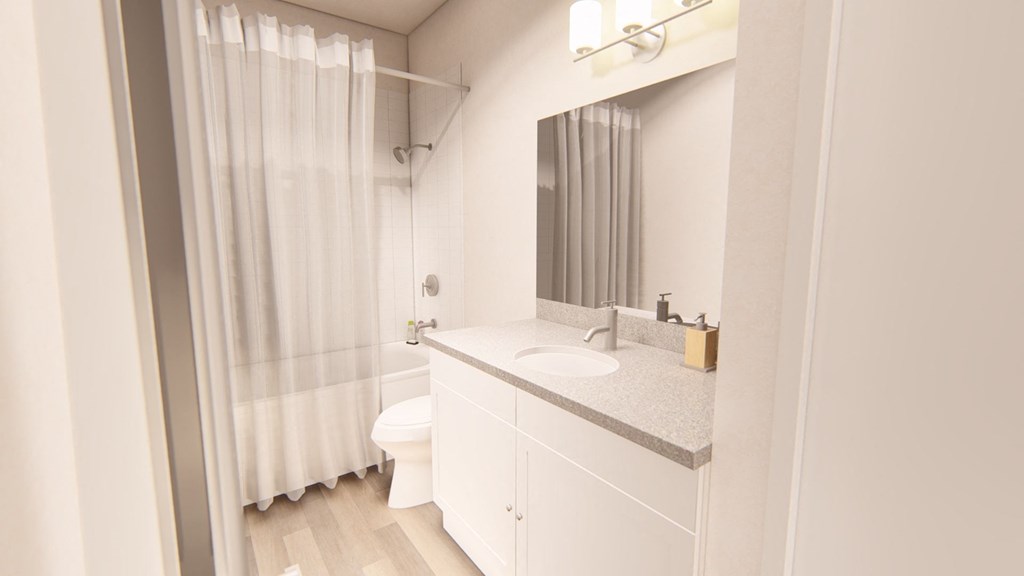 a bathroom with a sink and a toilet at Brownstones at Palisade Park Townhomes, Broomfield Colorado