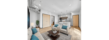 a living room with couches and a coffee table