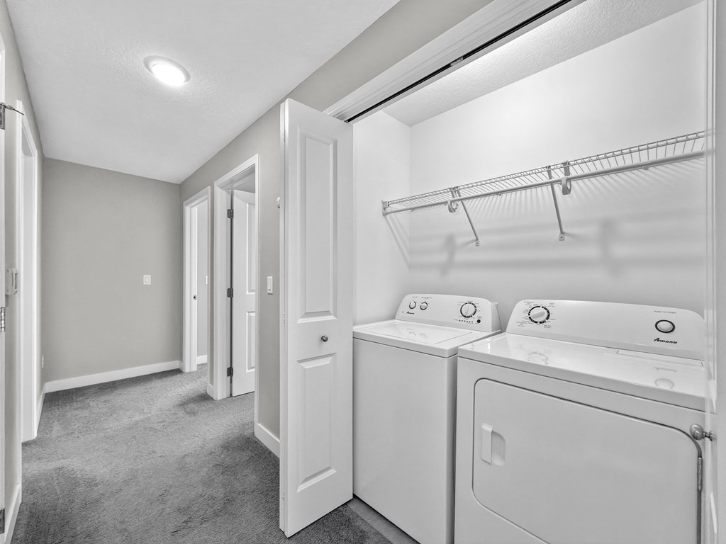 A laundry room with a washer and dryer.