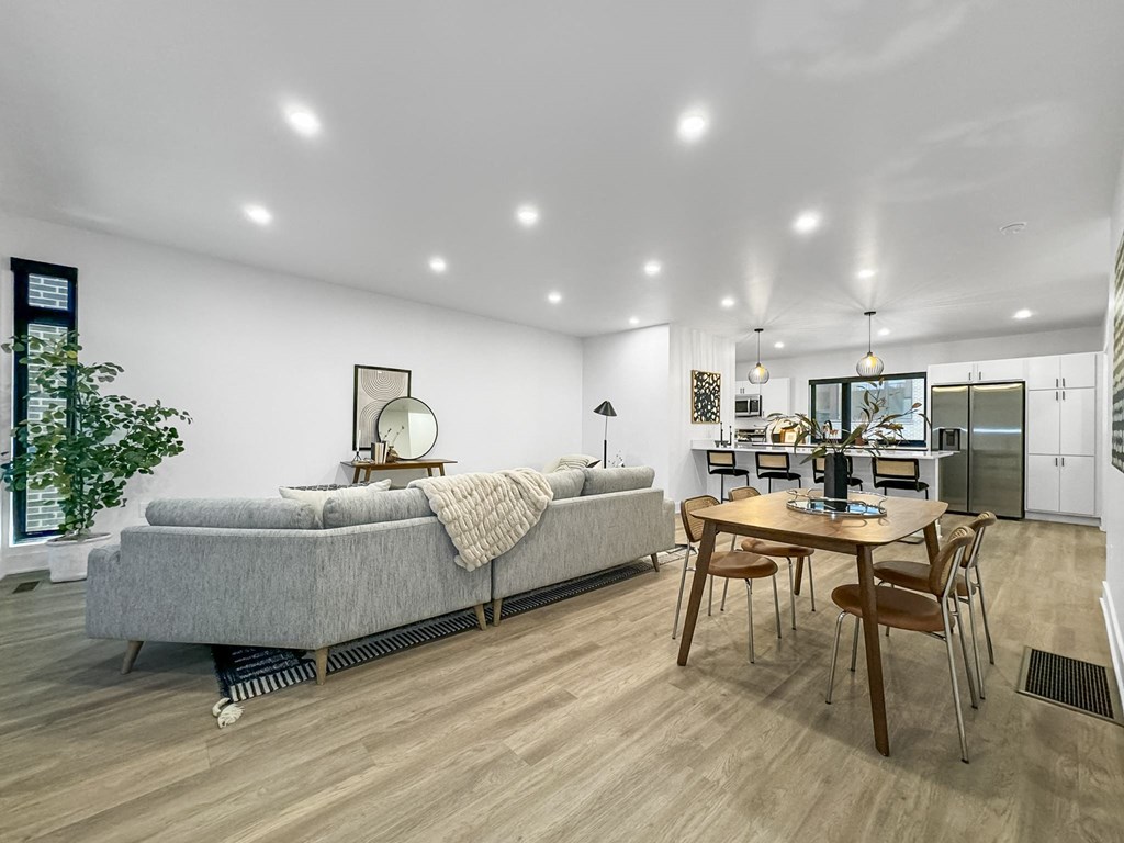 a living room with a couch and a table