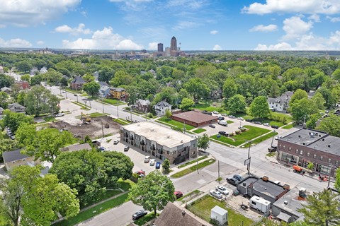 A small town with a church steeple in the distance.